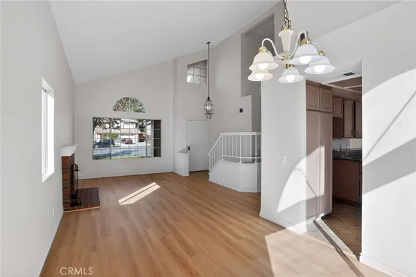 a view of a livingroom with wooden floor