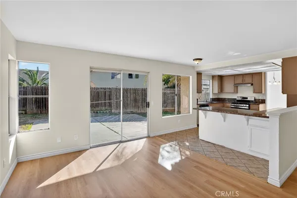 a kitchen with sink and window