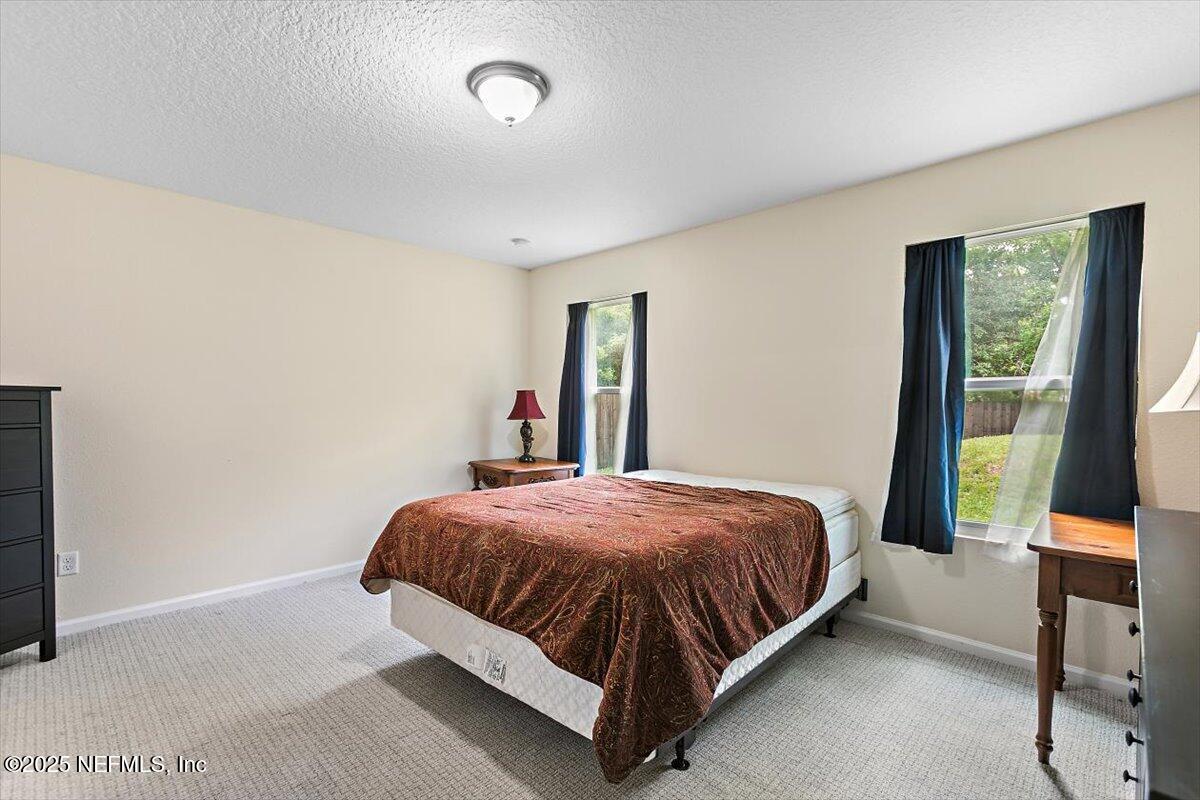 4116 Adirolf Road Jacksonville, FL 32207 - Photo 8 of 18 08-Primary Bedroom