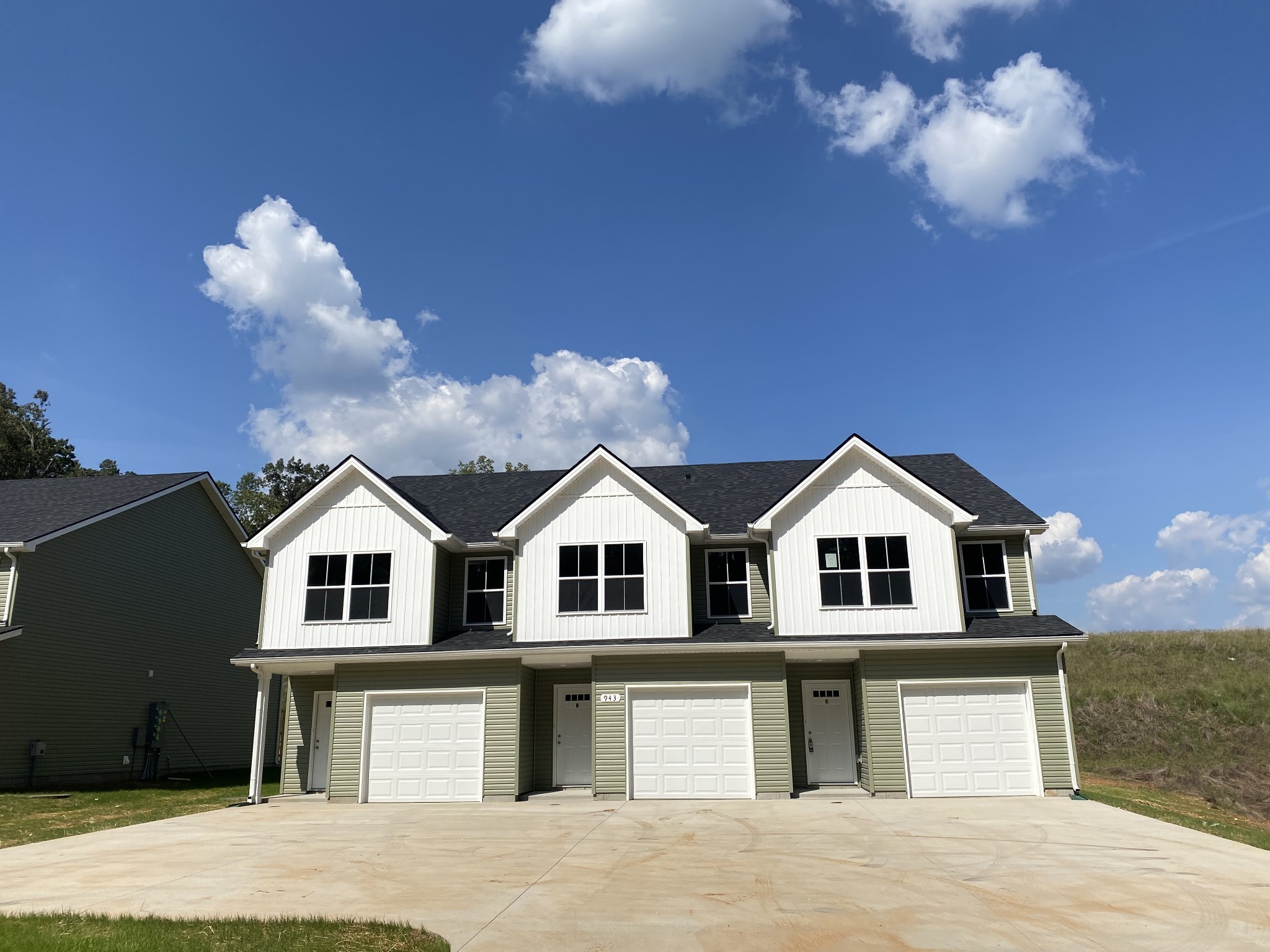 a view of a house with a roof deck