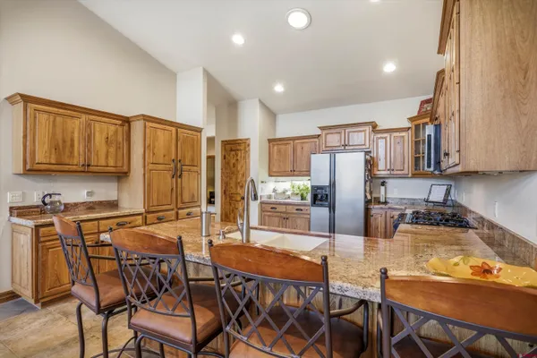 a kitchen with a cabinets and appliances