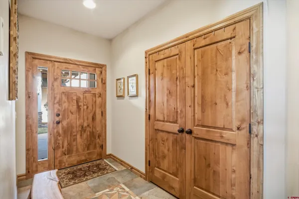 a room with furniture and a large window