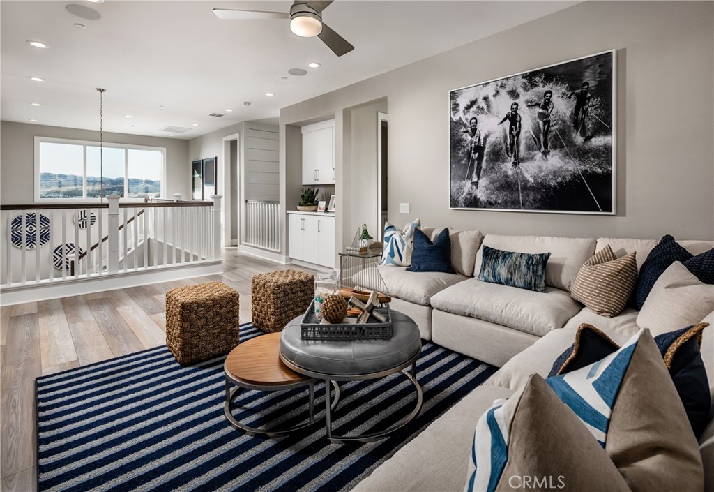 27562 Elderberry Drive Valencia, CA 91381 - Photo 8 of 18 a living room with furniture and kitchen view