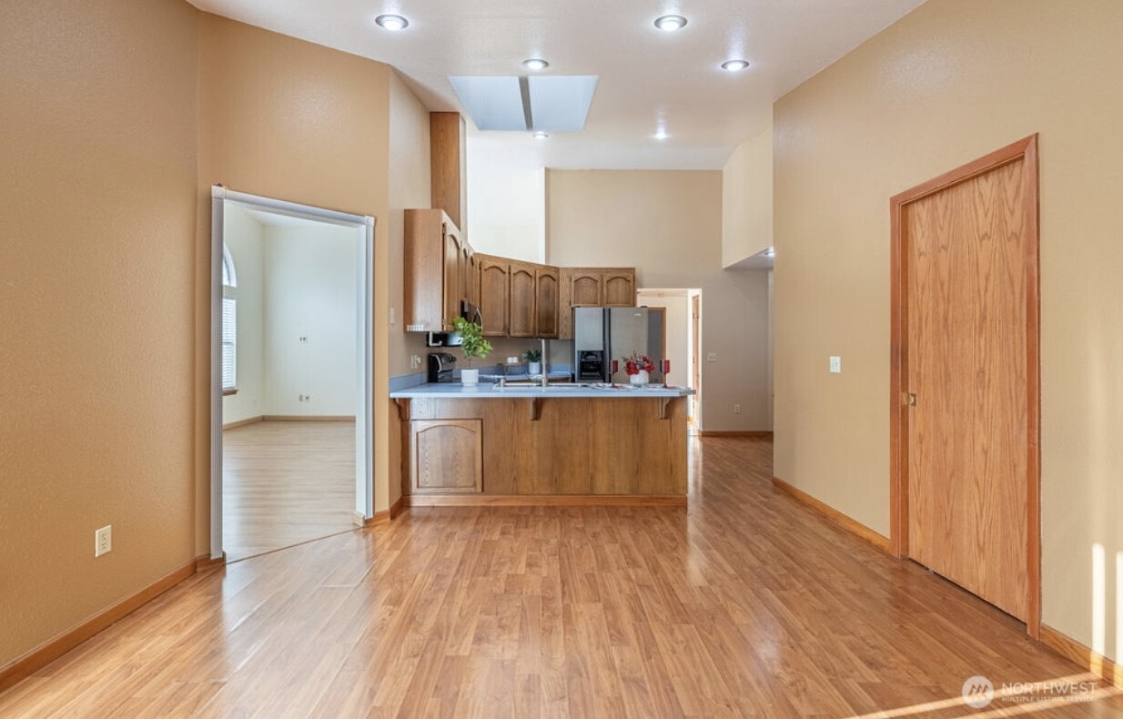 11209 Southeast 267th Place Kent, WA 98030 - Photo 12 of 27 a view of kitchen with wooden floor