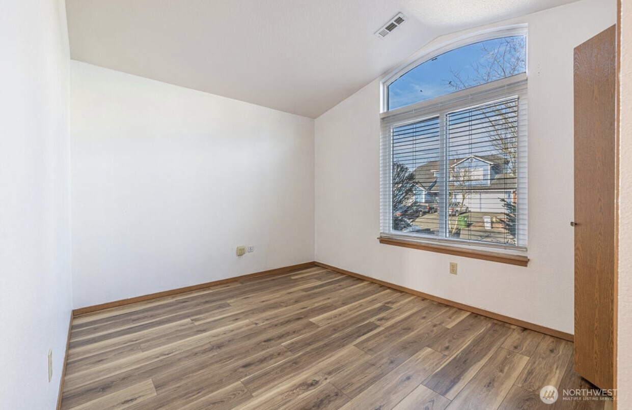 11209 Southeast 267th Place Kent, WA 98030 - Photo 23 of 27 a view of a room that has a window in it