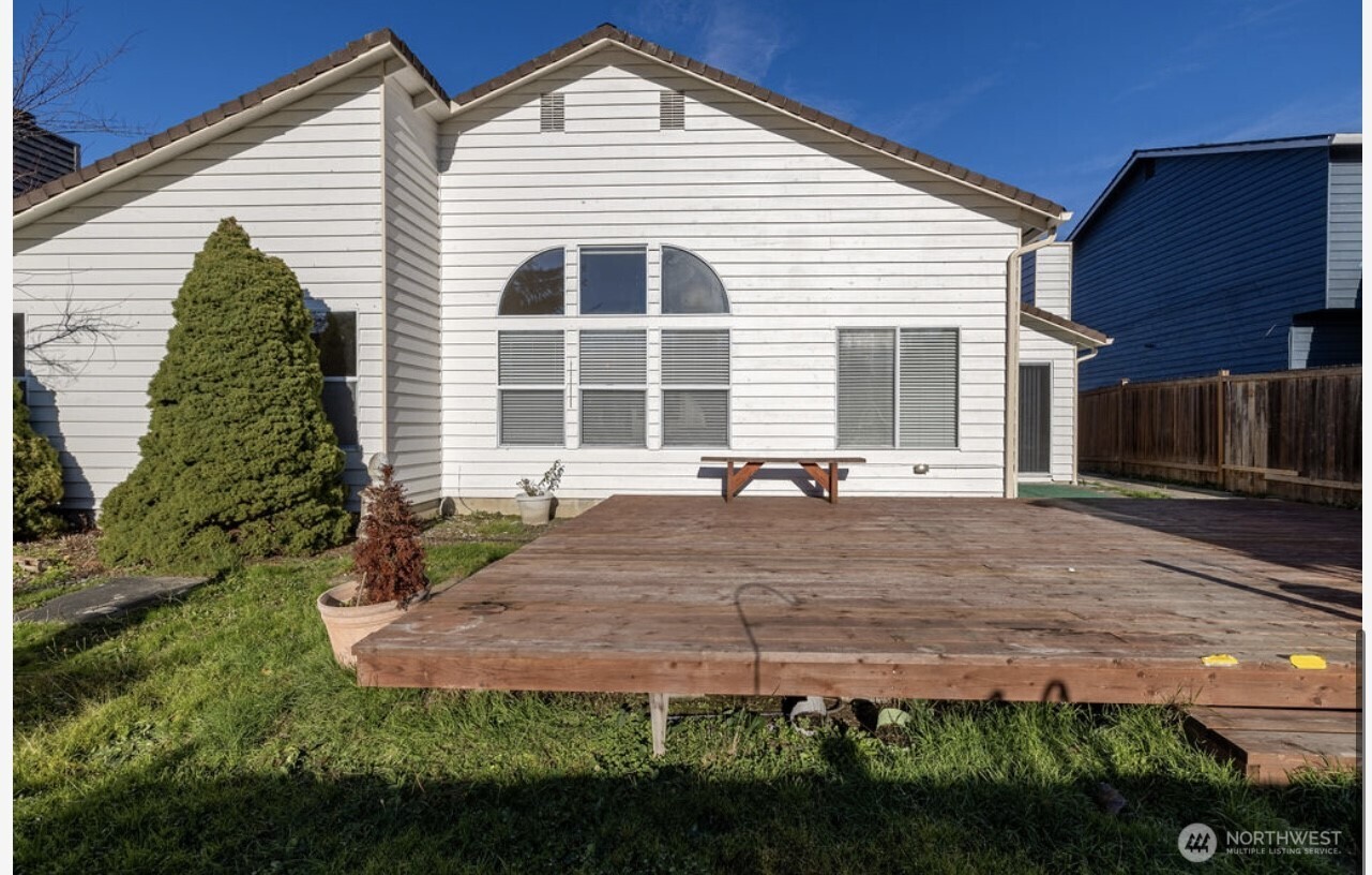 11209 Southeast 267th Place Kent, WA 98030 - Photo 27 of 27 a front view of a house with a yard