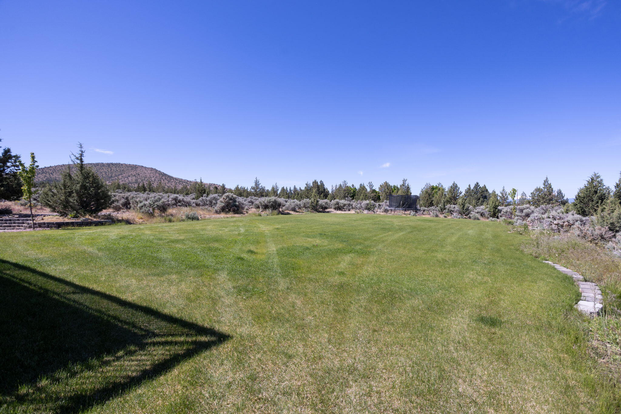 14224 Southwest Howlett Drive Powell Butte, OR 97753 - Photo 23 of 45 Yard view looking sw