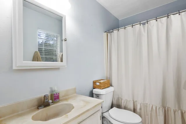 a view of a back yard of the house