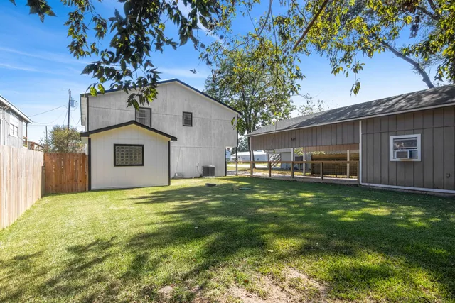 a view of a swimming pool with lounge chairs