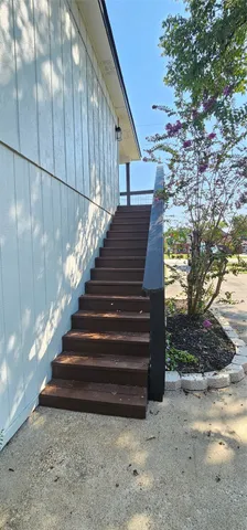 a view of a yard with swimming pool