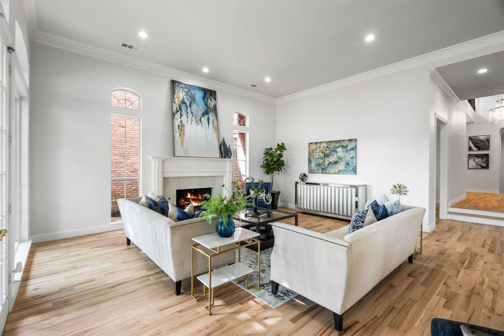5120 Briar Tree Drive Dallas, TX 75248 - Photo 11 of 40 a living room with furniture and a fireplace
