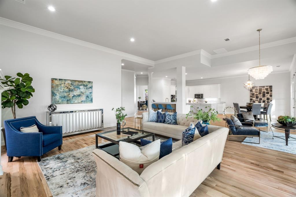 5120 Briar Tree Drive Dallas, TX 75248 - Photo 12 of 40 a living room with furniture a lamp and a potted plant