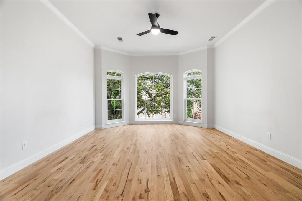 5120 Briar Tree Drive Dallas, TX 75248 - Photo 17 of 40 wooden floor in an empty room with a window