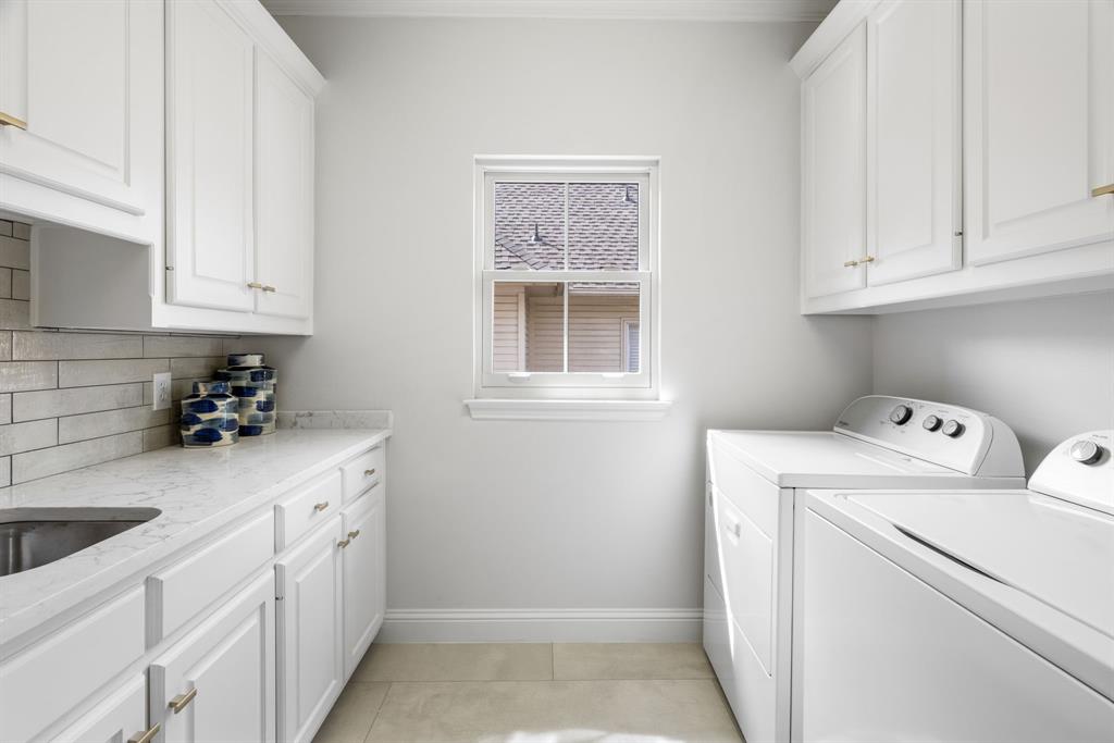 5120 Briar Tree Drive Dallas, TX 75248 - Photo 19 of 40 a utility room with dryer and washer