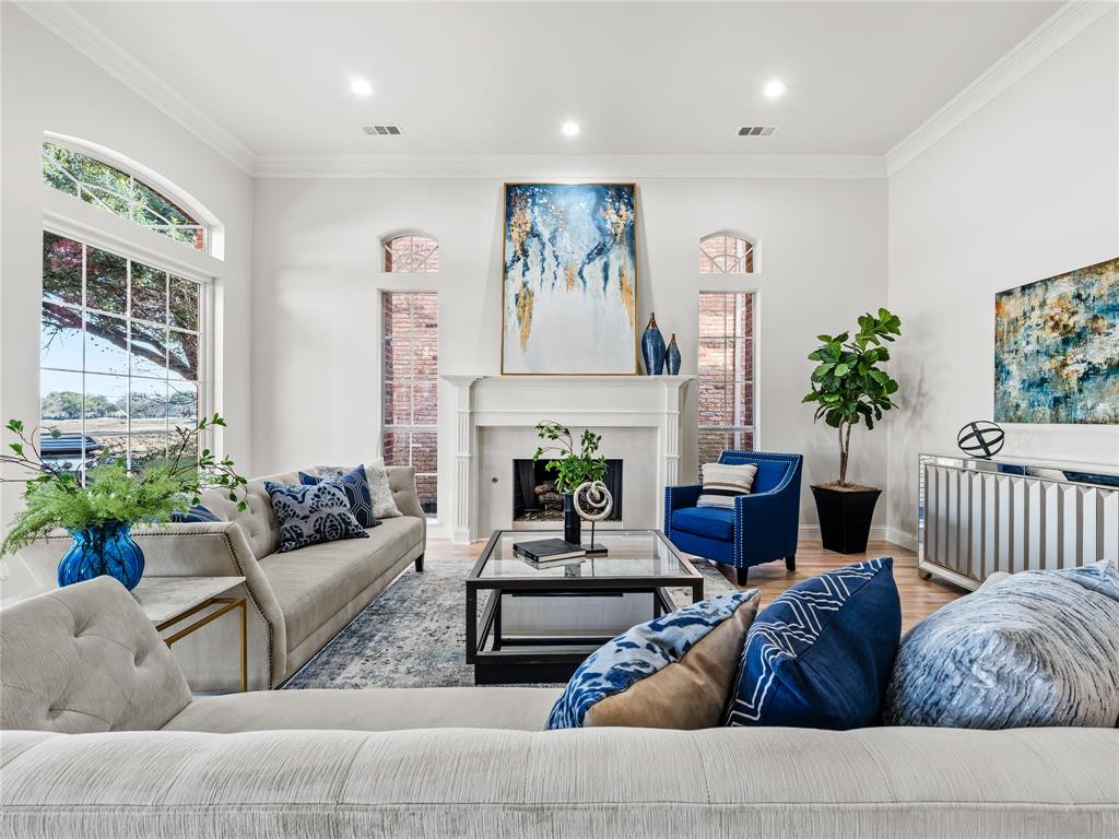5120 Briar Tree Drive Dallas, TX 75248 - Photo 24 of 40 a living room with furniture and a fireplace