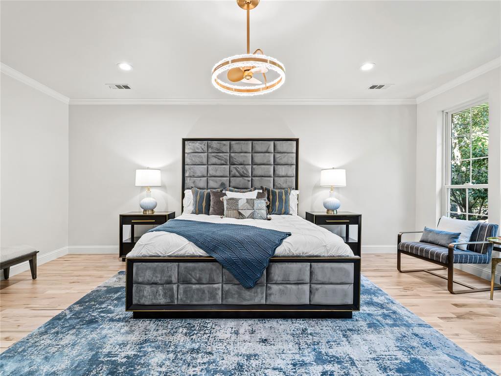 5120 Briar Tree Drive Dallas, TX 75248 - Photo 26 of 40 a bedroom with bed and a table