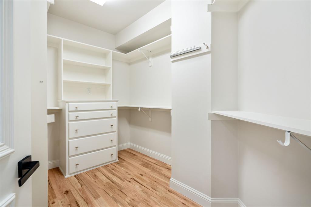 5120 Briar Tree Drive Dallas, TX 75248 - Photo 28 of 40 a view of walk in closet with empty racks