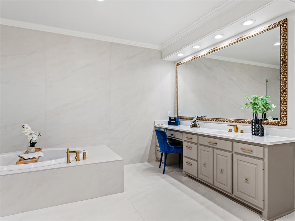 5120 Briar Tree Drive Dallas, TX 75248 - Photo 30 of 40 a bathroom with a sink and a mirror