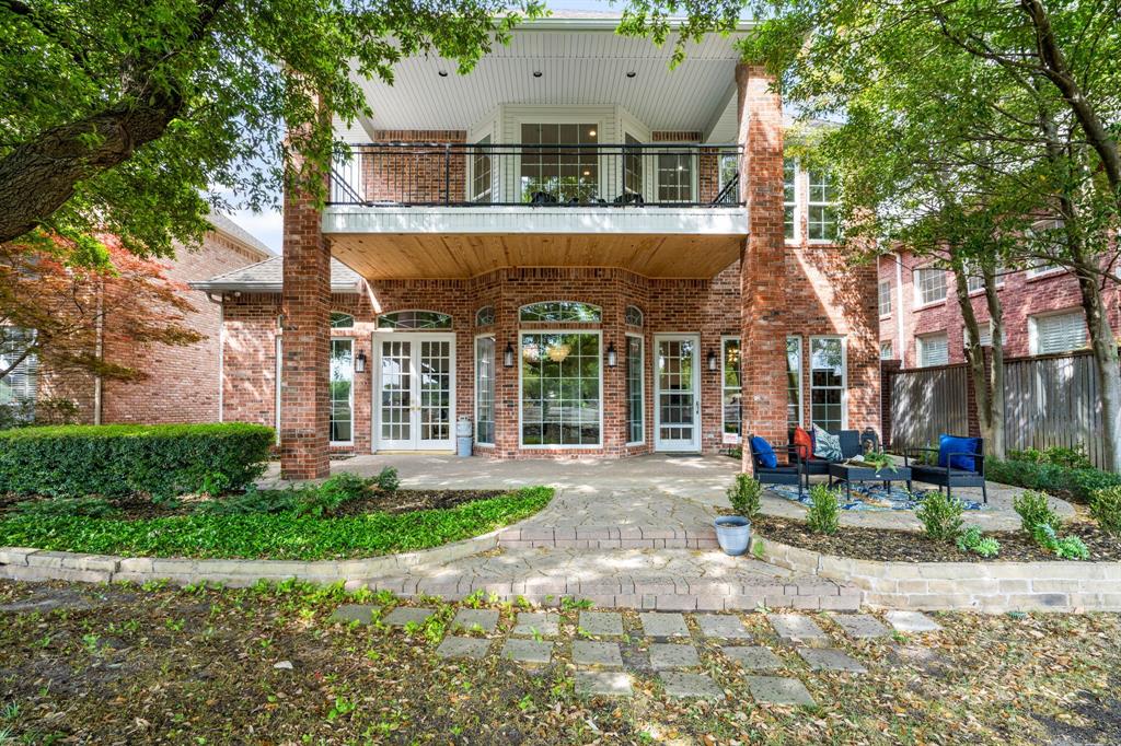 5120 Briar Tree Drive Dallas, TX 75248 - Photo 33 of 40 a front view of a house with garden and plants