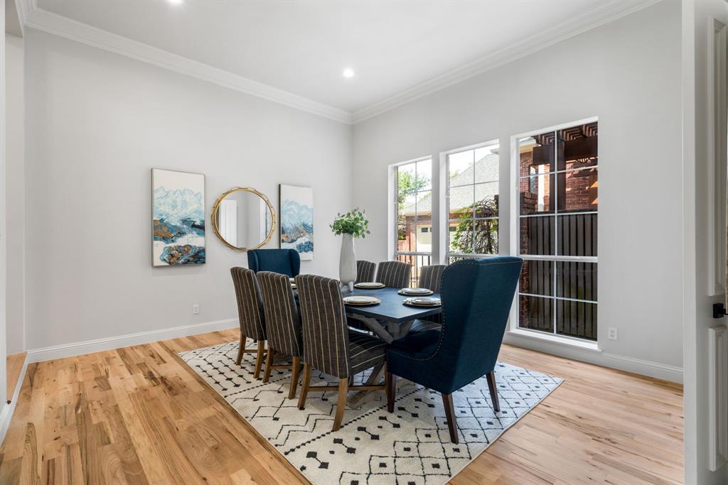 5120 Briar Tree Drive Dallas, TX 75248 - Photo 4 of 40 a view of a dining room with furniture window and wooden floor