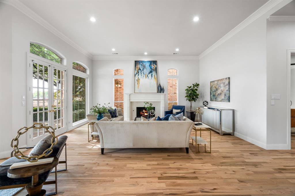 5120 Briar Tree Drive Dallas, TX 75248 - Photo 10 of 40 a living room with furniture and a fireplace