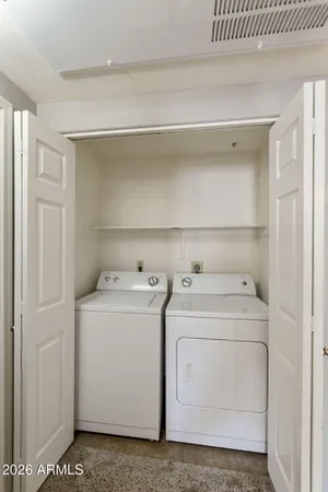 a utility room with dryer and washer