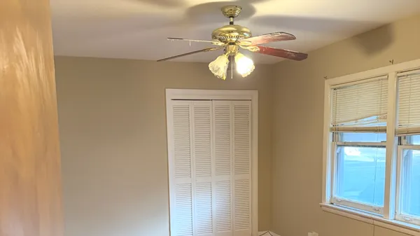 a view of a door and a window