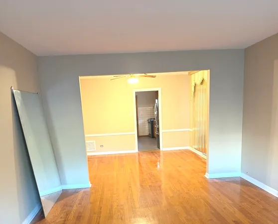 a view of an empty room and window