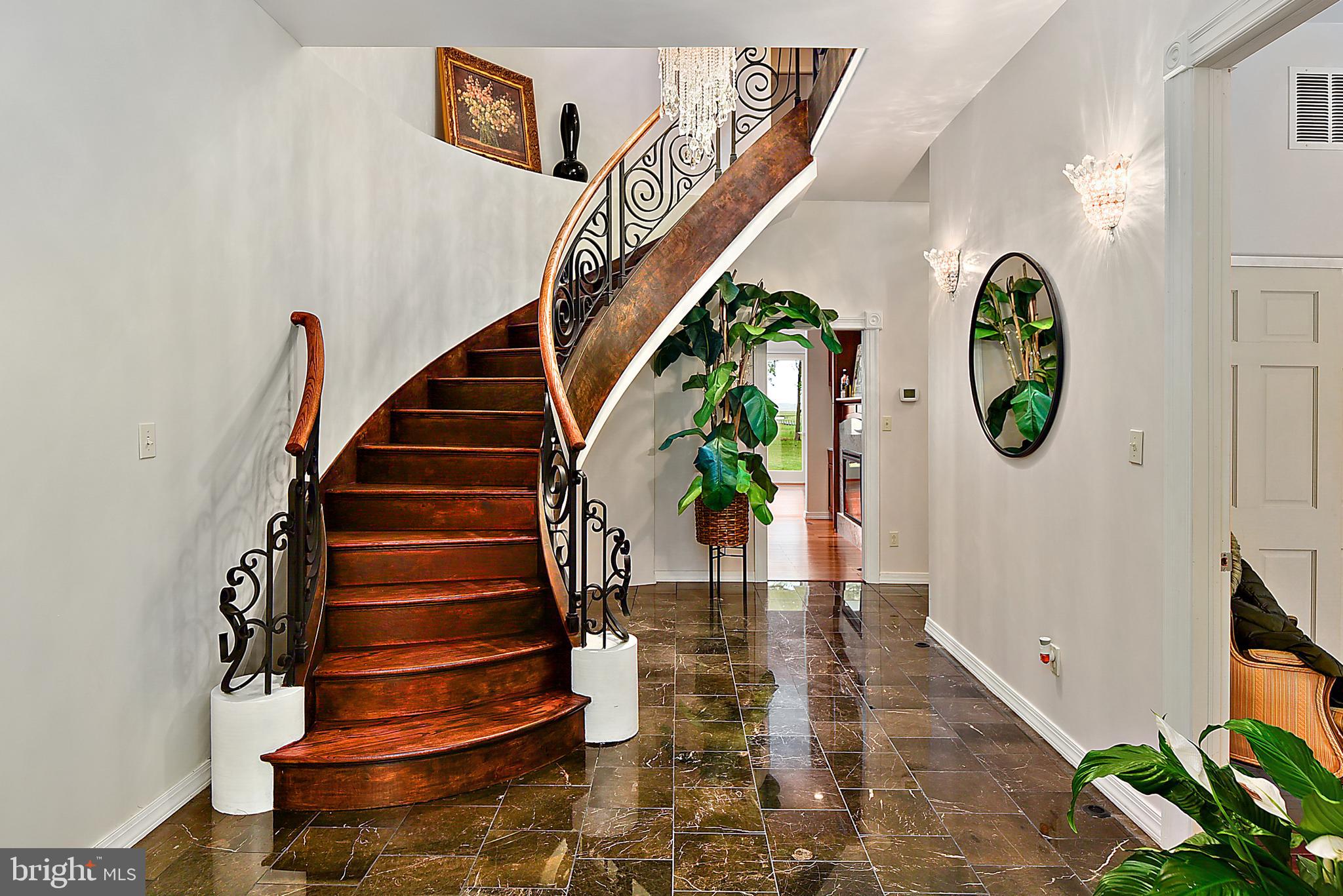 6345 South Point Road Berlin, MD 21811 - Photo 4 of 107 Foyer w/ Winding Wooden Oak Staircase