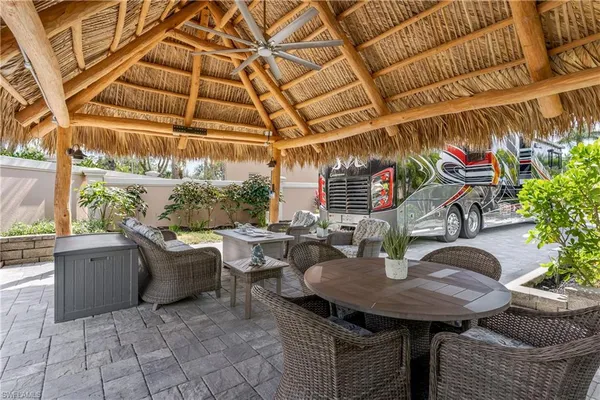 a view of a tables and chairs in patio