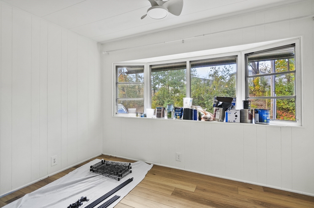 83 Clark Road, Unit 41 Shirley, MA 01464 - Photo 13 of 26 a view of room with window and a ceiling fan