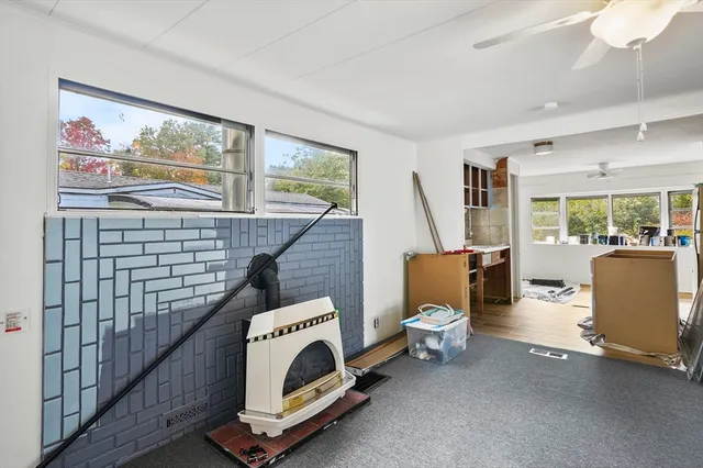 a kitchen that has a sink and a refrigerator