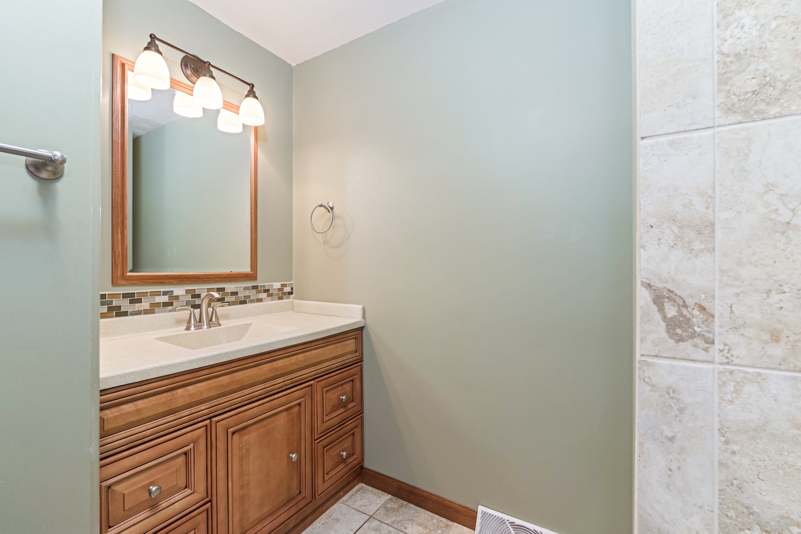22 Ardith Drive Normal, IL 61761 - Photo 33 of 51 a bathroom with a sink and a mirror