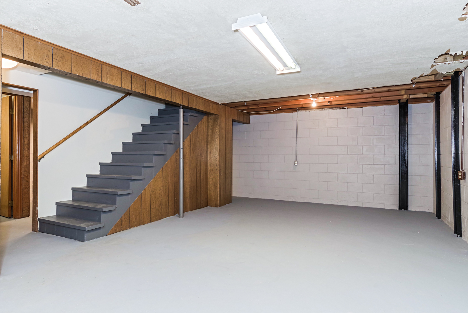 22 Ardith Drive Normal, IL 61761 - Photo 36 of 51 a view of an empty room with stairs