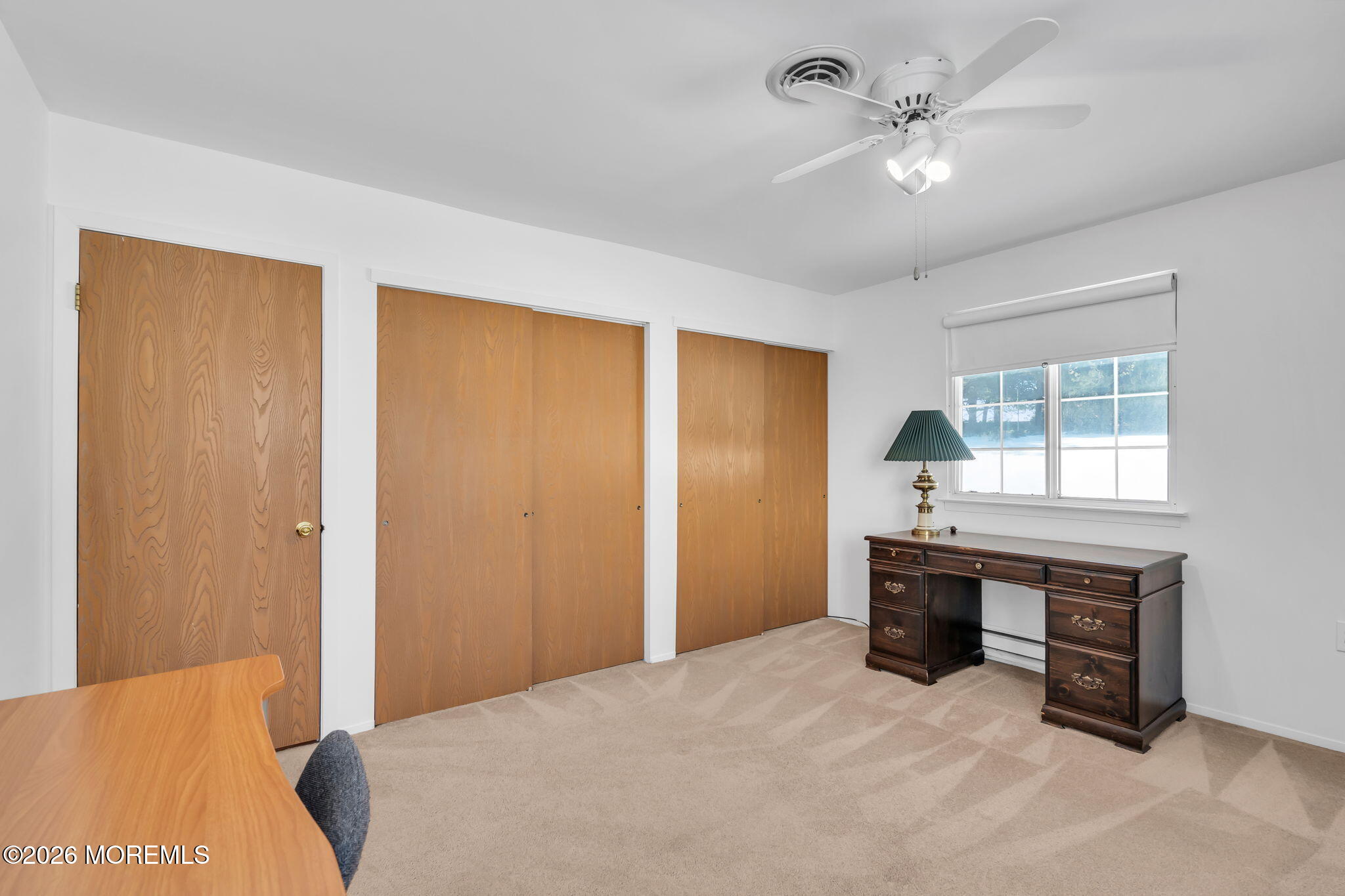 4 Andover Court, Unit 64 Whiting, NJ 08759 - Photo 18 of 23 a bedroom with a bed and a window