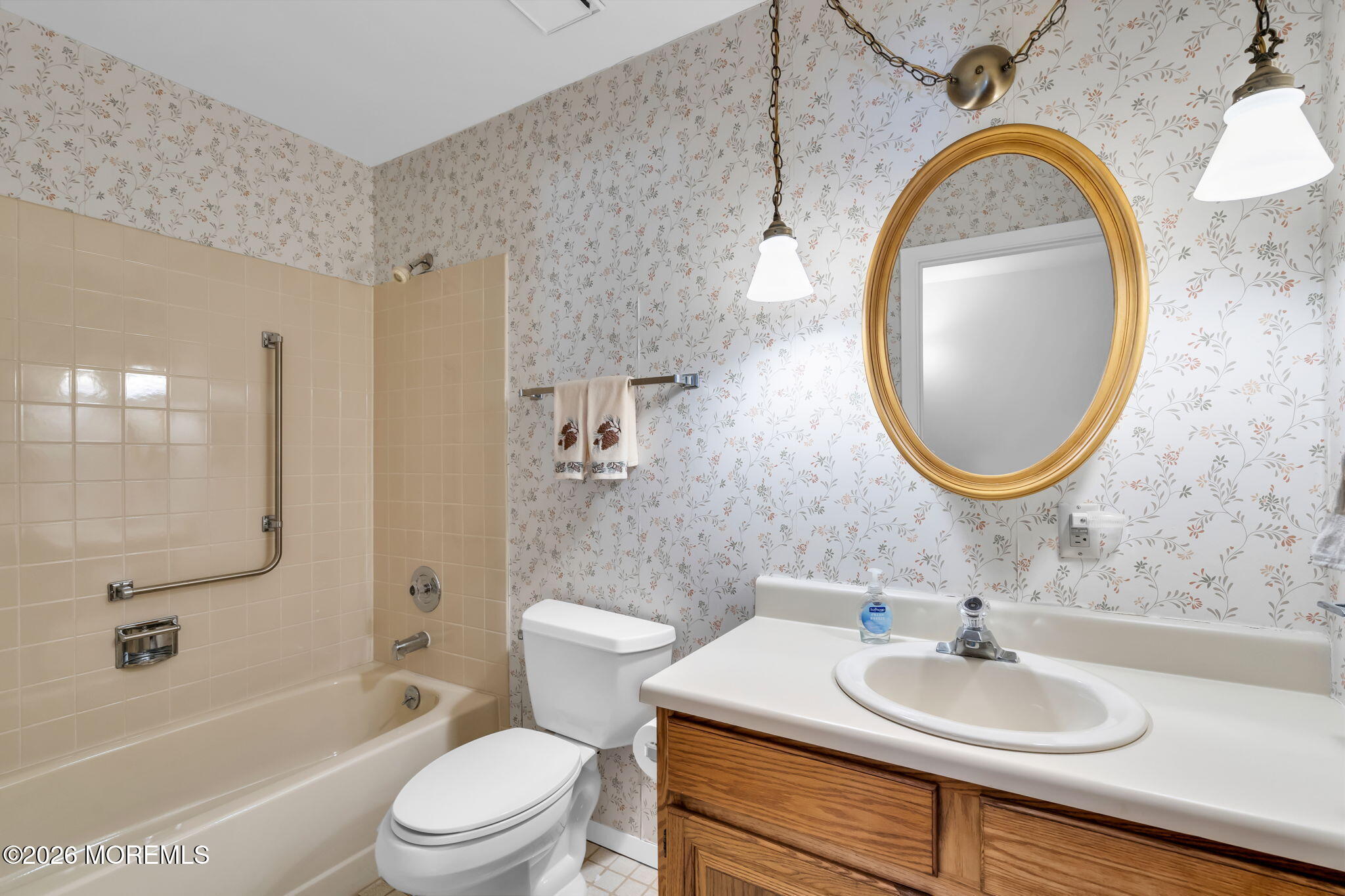 4 Andover Court, Unit 64 Whiting, NJ 08759 - Photo 20 of 23 a bathroom with a sink and a mirror