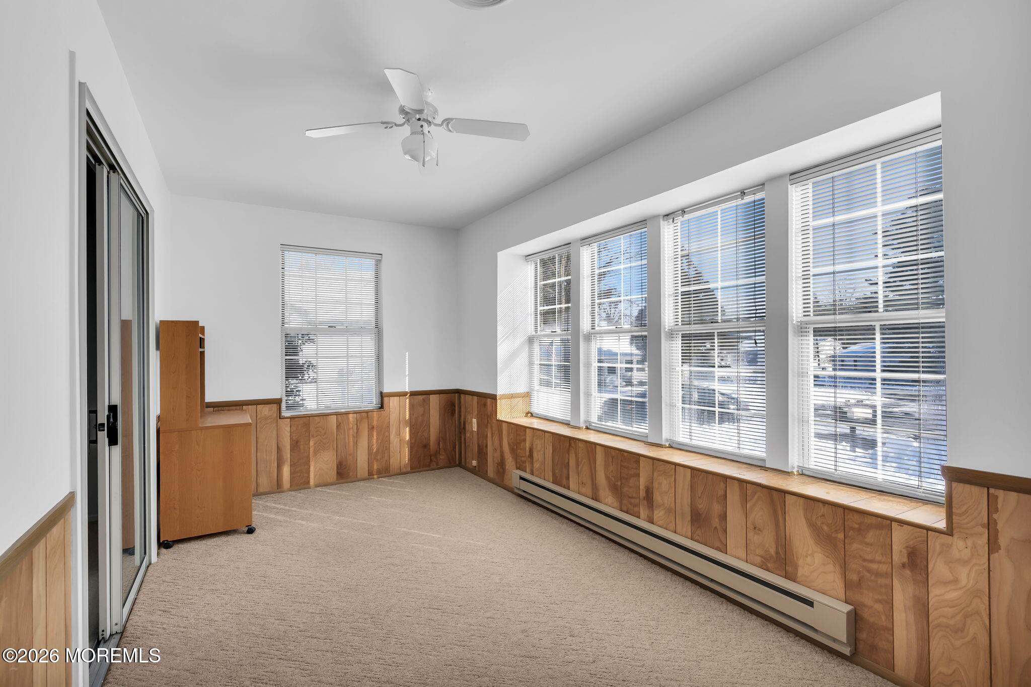 4 Andover Court, Unit 64 Whiting, NJ 08759 - Photo 4 of 23 a view of an empty room with a window