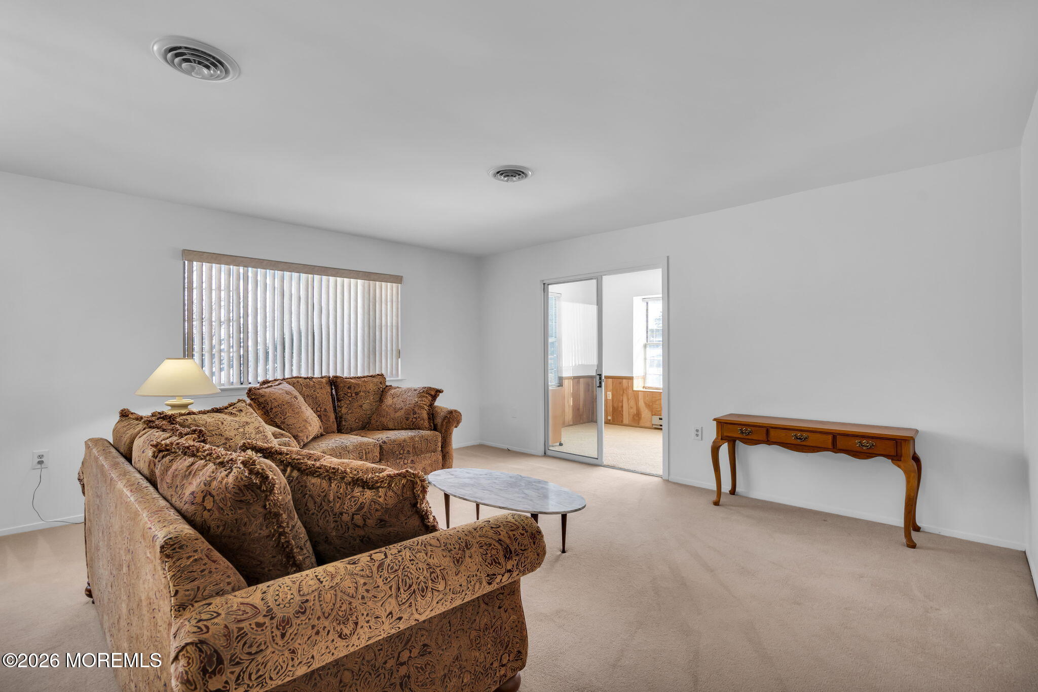 4 Andover Court, Unit 64 Whiting, NJ 08759 - Photo 5 of 23 a living room with furniture and a window