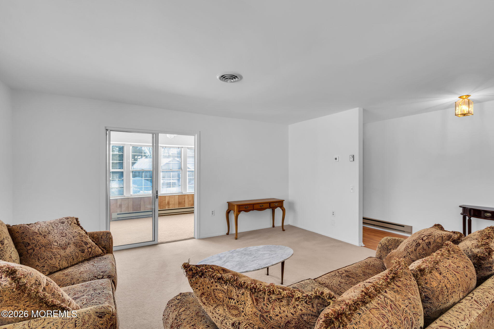 4 Andover Court, Unit 64 Whiting, NJ 08759 - Photo 6 of 23 a bedroom with furniture and a window