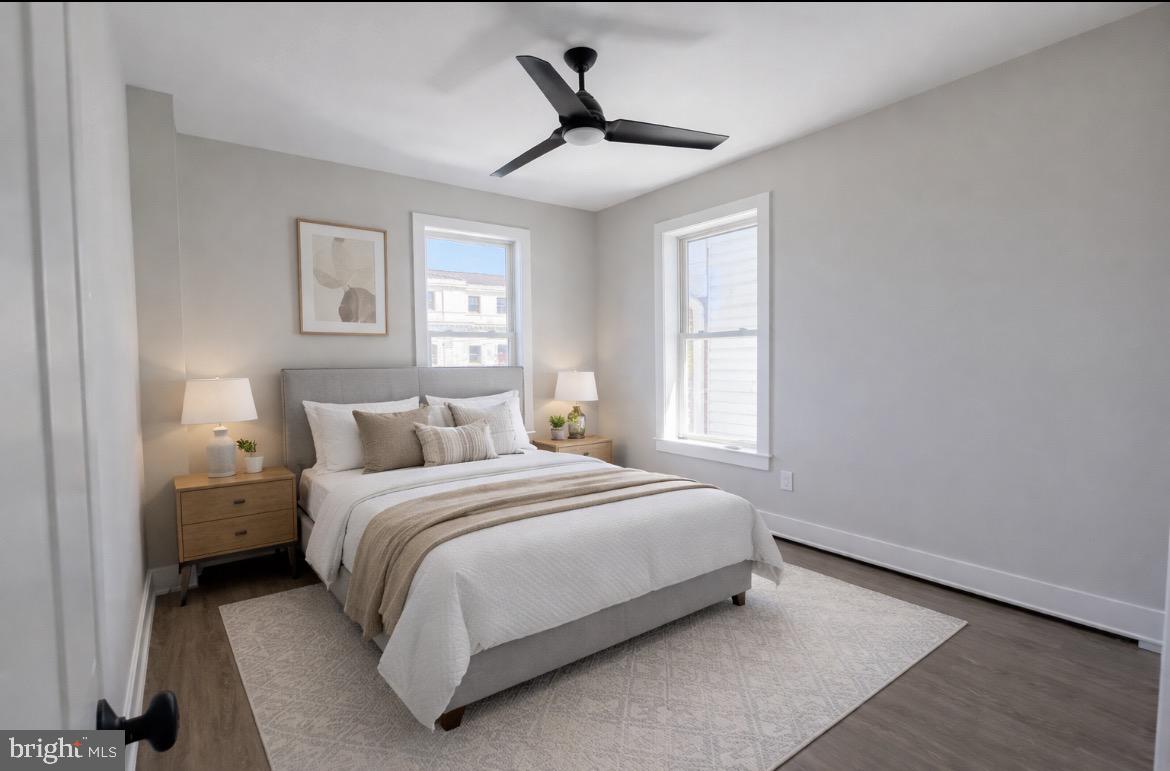 216 West Front Street, Unit 3 Media, PA 19063 - Photo 14 of 17 a bedroom with a bed and a window