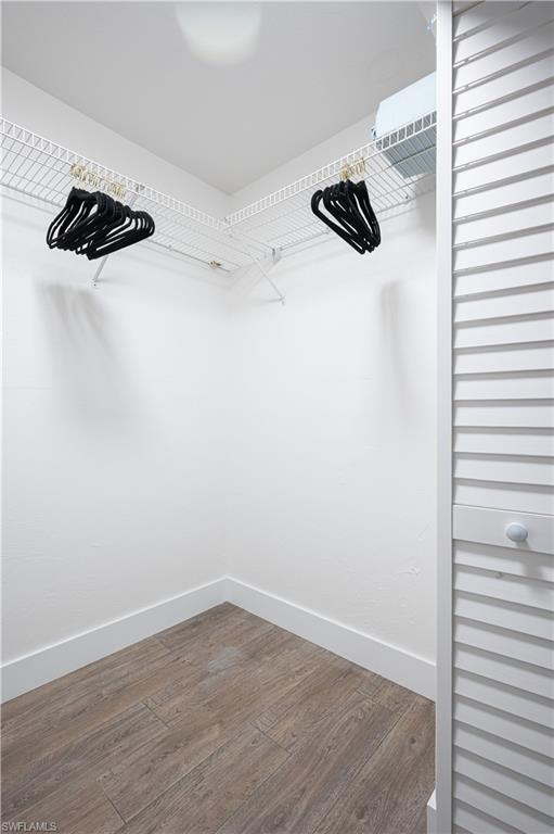 507 14th Street North Naples, FL 34102 - Photo 15 of 33 Spacious closet with hardwood / wood-style floors