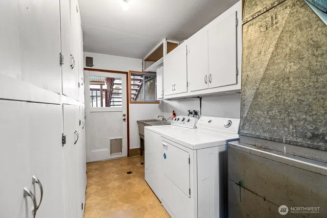 a utility room with dryer and washer