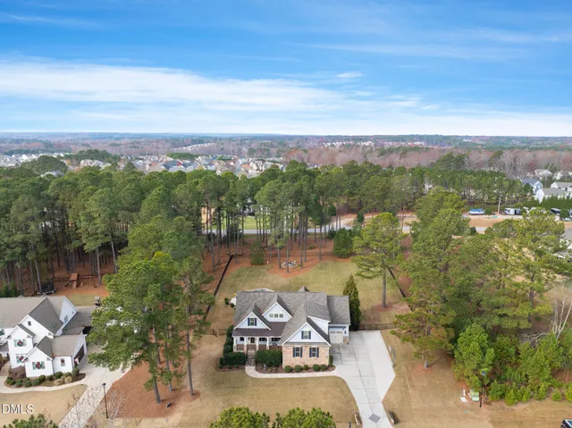 an aerial view of a city with lots of residential buildings