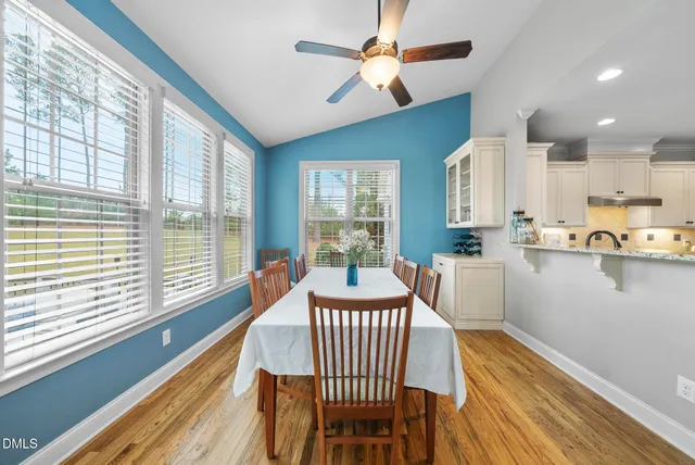 a view of walk in closet with clothes