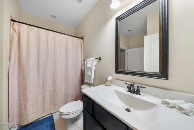 a view of a water with mountains in the background