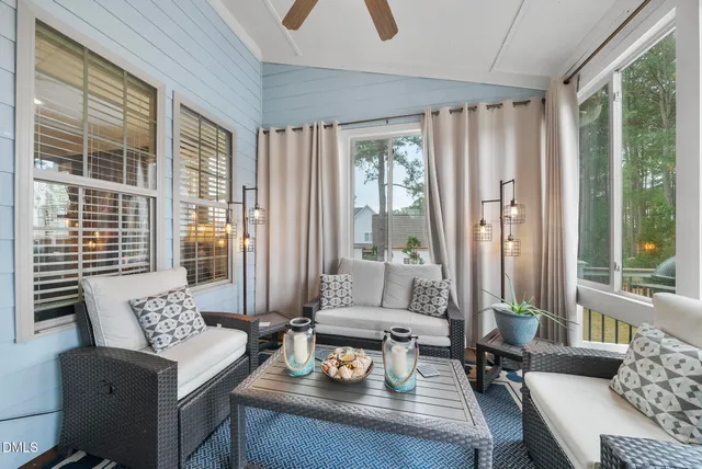 an aerial view of a house with swimming pool