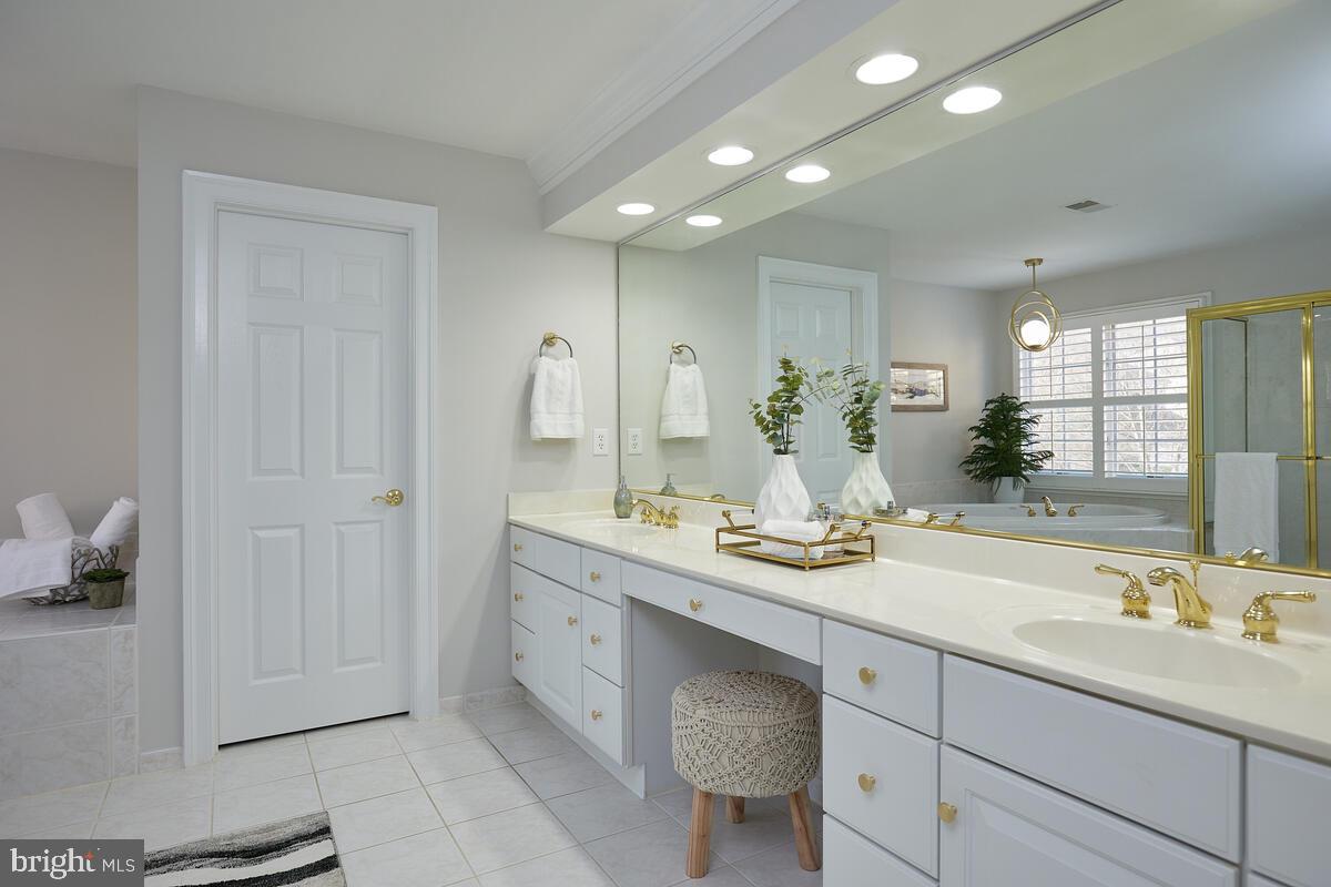 11404 Ridge Mist Terrace Potomac, MD 20854 - Photo 18 of 33 Primary Bathroom with Dual Sinks & Toilet Room