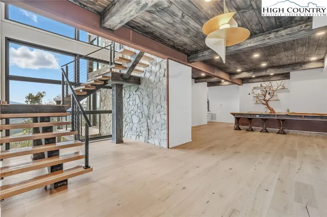 a view of a workspace with furniture