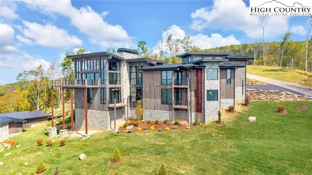 a front view of a house with a patio