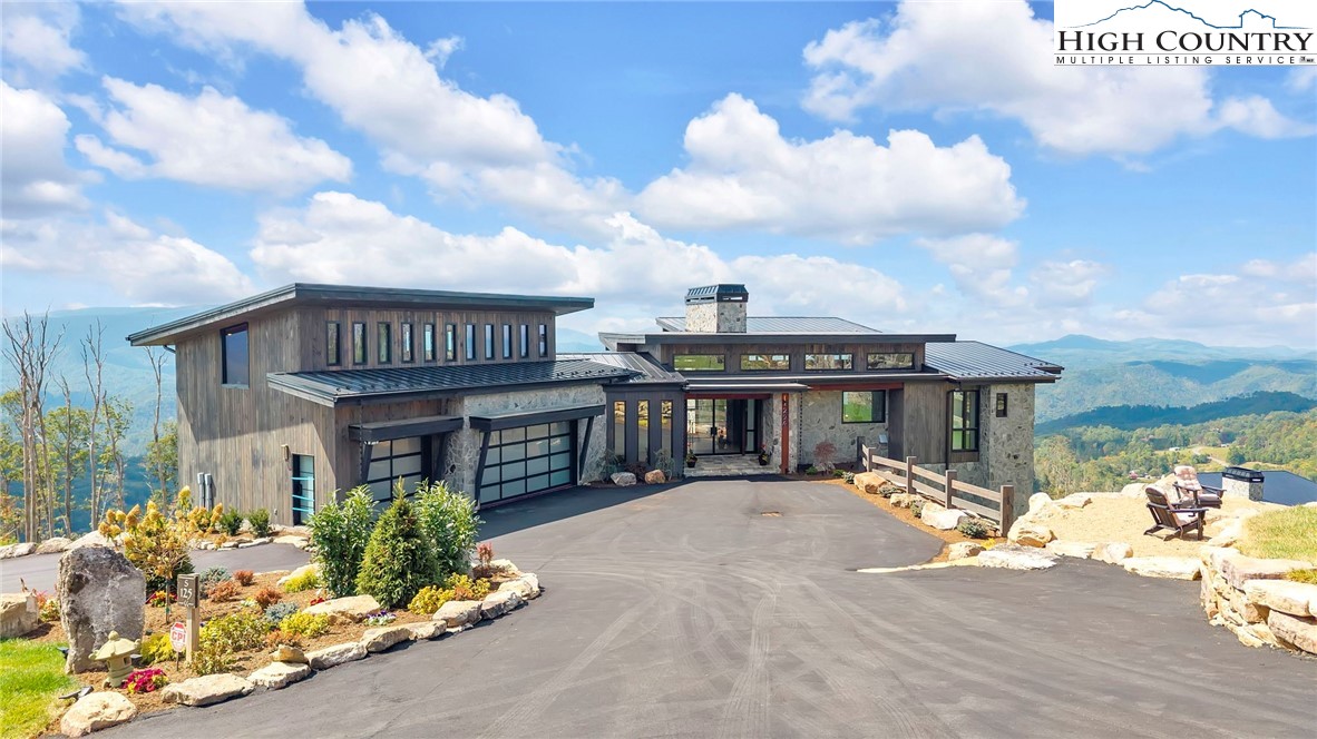 294 Silver Eagle Trail Banner Elk, NC 28604 - Photo 46 of 50 a front view of a house with a patio